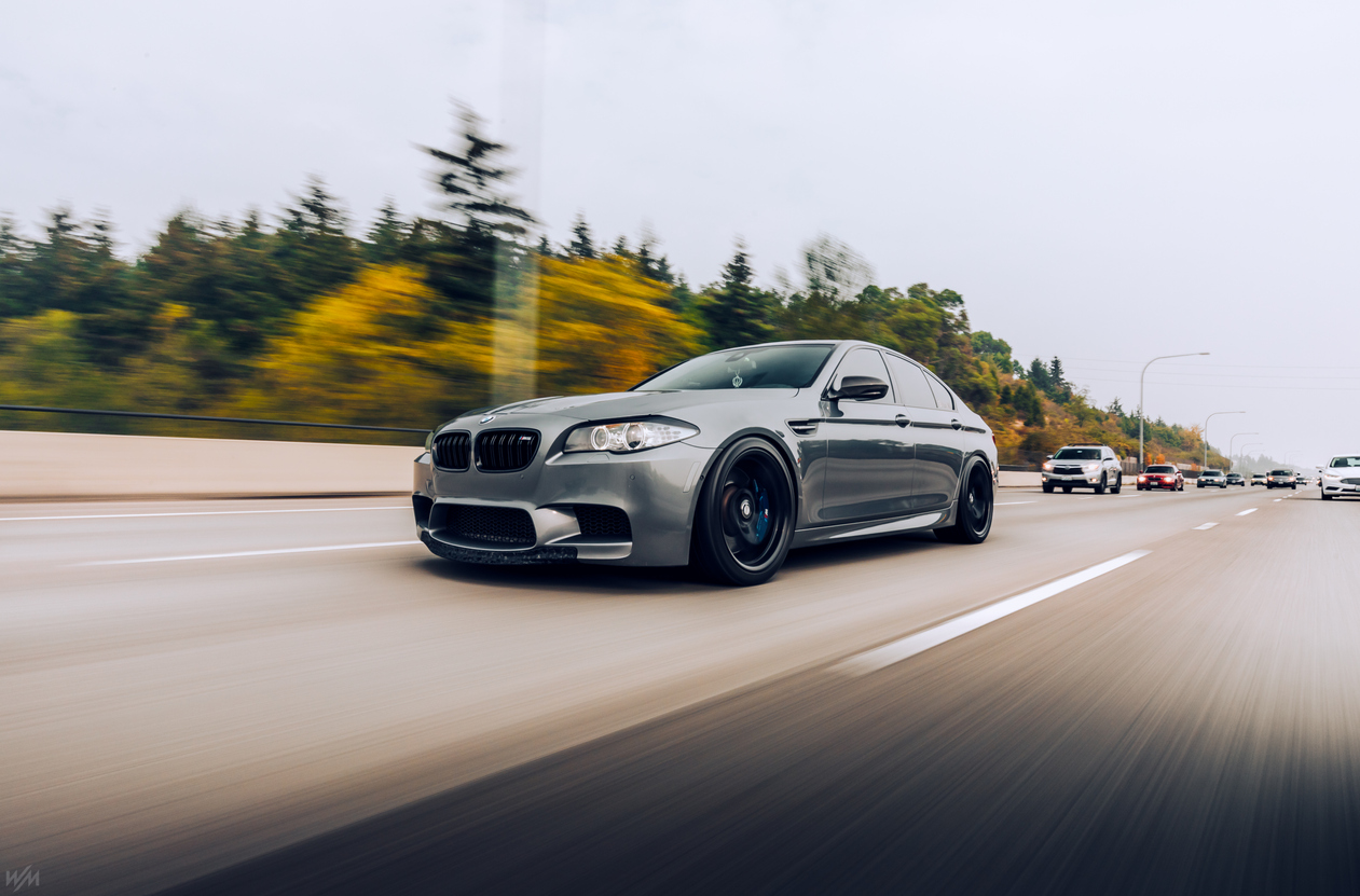 Gray BMW moving on the highway